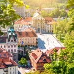 Aerial cityscape view with Ursuline church of the Holy Trinity in Ljubljana